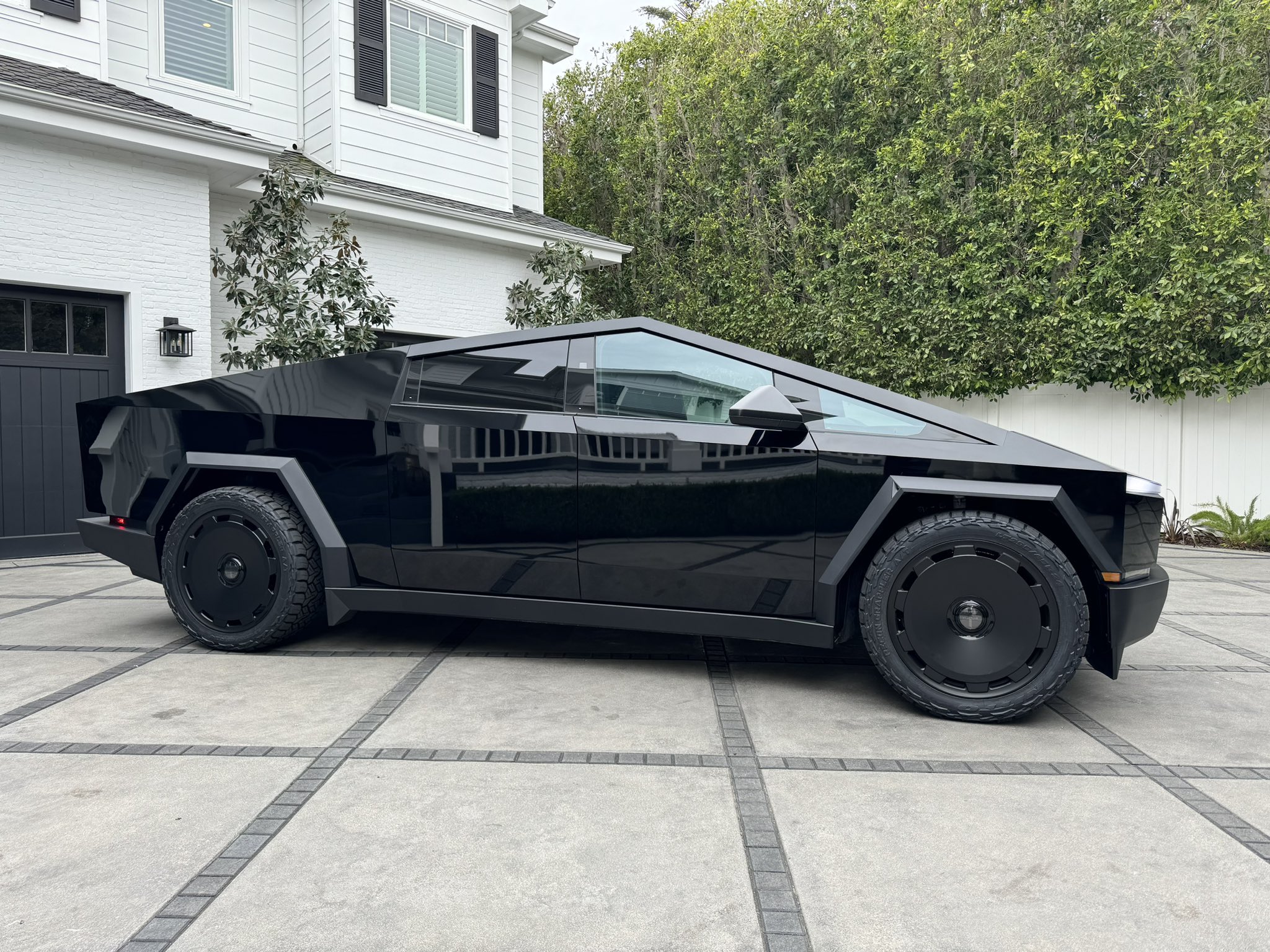 Cybertruck in gloss black wrap + TSportline 24